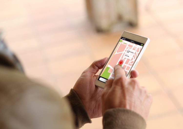 Man using an app that uses GPS